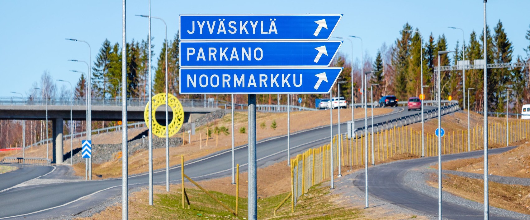 Overhead gantries and road sign posts